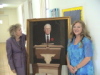 Lillian and Susy with Portrait of Dr. Wesberry