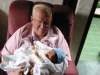 Grandad holds Perry Andrew